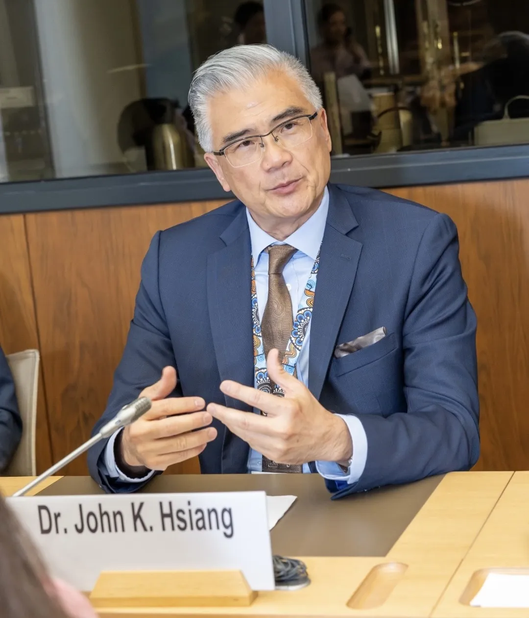 Dr. John K. Hsiang addresses delegates at the WTO 2026 Public Forum in Geneva
